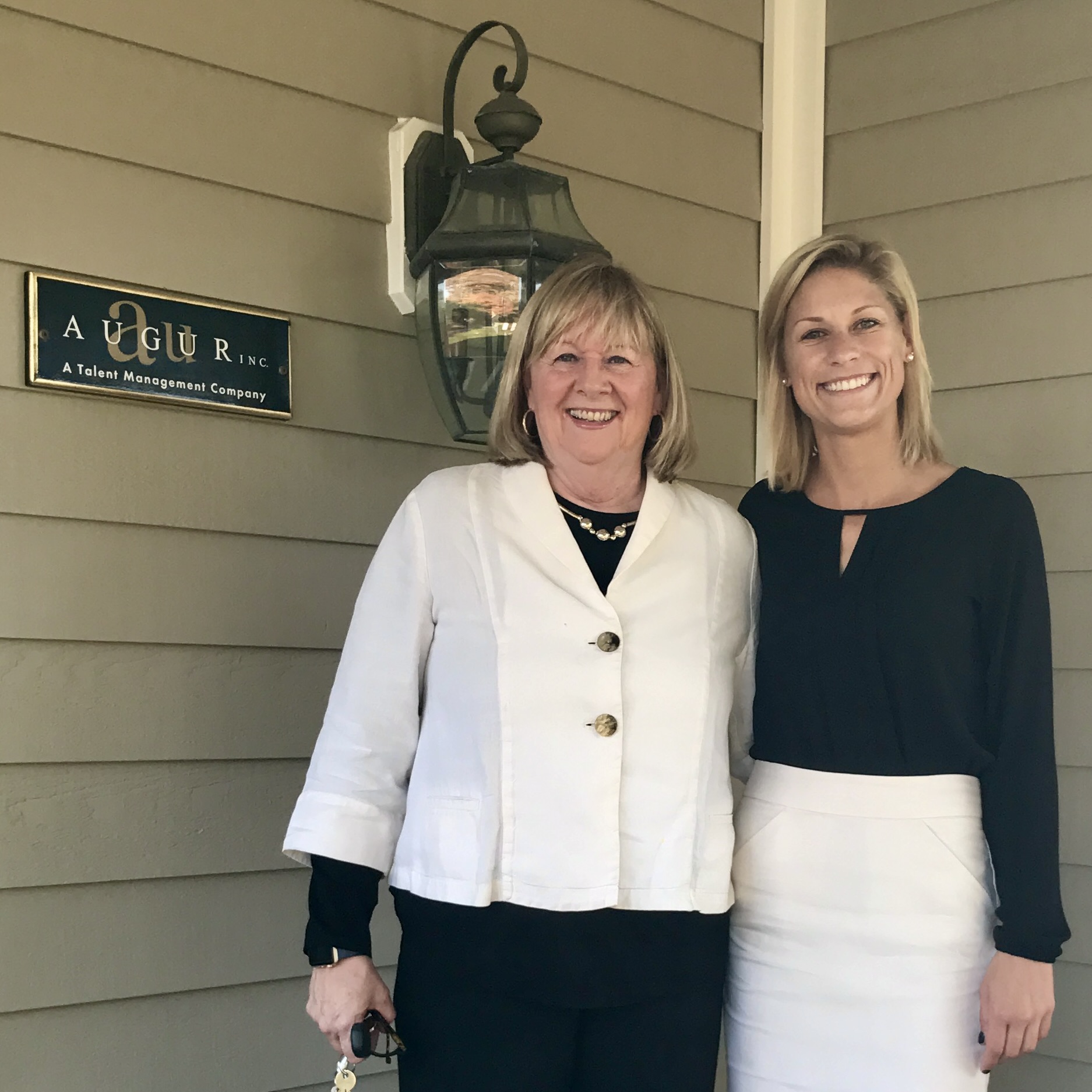 Kathy Frank and Alexis Finley together outside the Augur Inc. office.